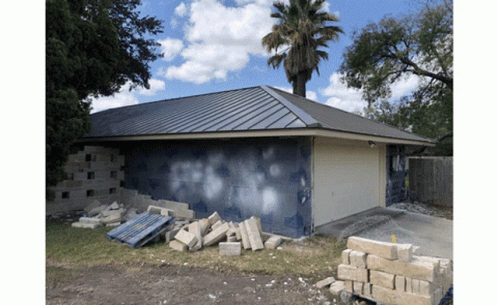 House With Palm Tree Being Built GIF