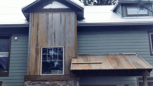 House With Tin Roof And Window GIF