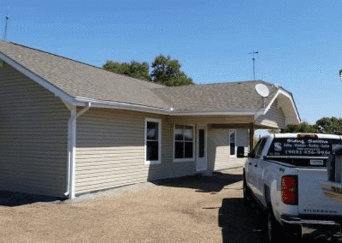 House With Truck Parked In Front GIF