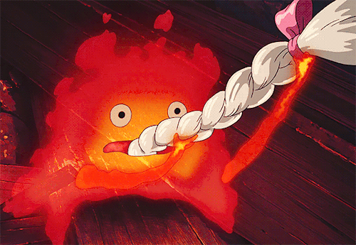 Howl's Moving Castle Calcifer Eating Hair GIF