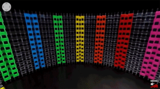Huge Colorful Dominos Falling GIF