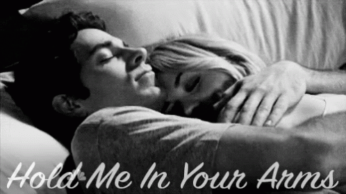 Hugging Man and Woman Hold Me in Your Arms