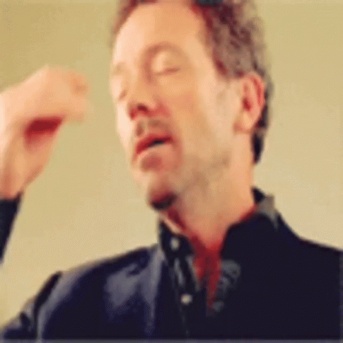 Hugh Laurie Slapping Face GIF