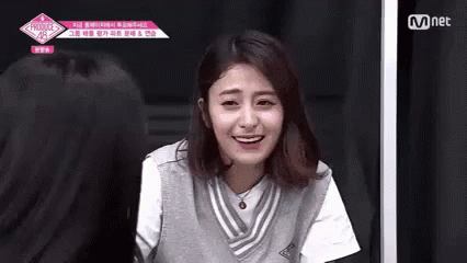 Huh Yunjin Sensible Chuckle GIF