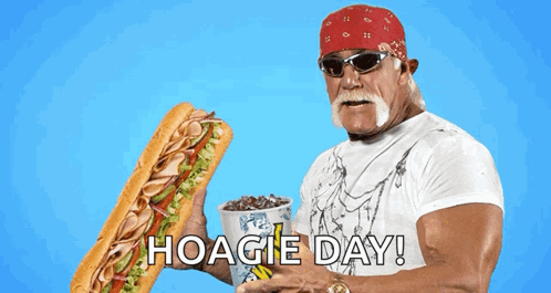 Hulk Hogan Is Holding A Sub Sandwich And A Cup Of Soda With Hoagie Day Written On The Bottom GIF