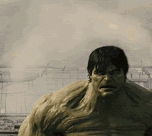 Hulk Standing in Front of Burning Building