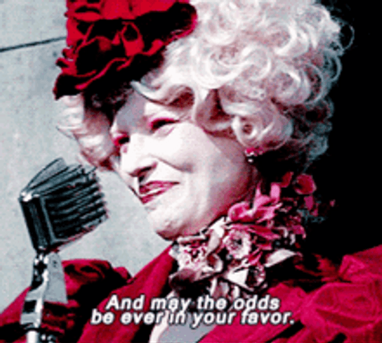Hunger Games Effie May The Odds Be Ever In Your Favor GIF