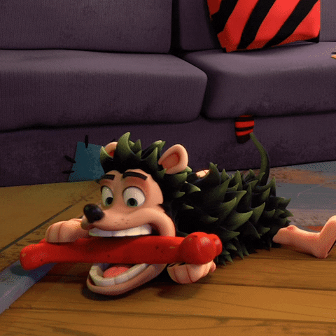 Hungry Dennis And Gnasher Chewing Bone GIF