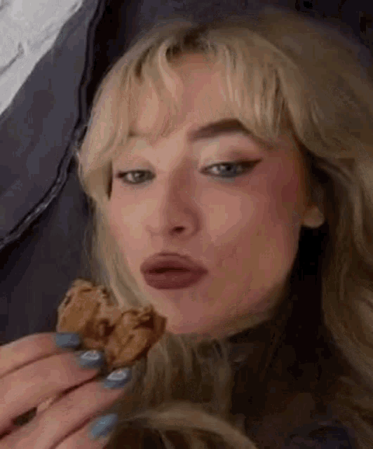 Hungry Sabrina Carpenter Eating A Cookie GIF