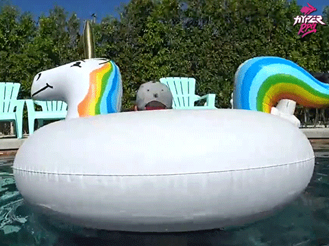 Hyper Man In Swimming Pool With Inflatable Unicorn GIF