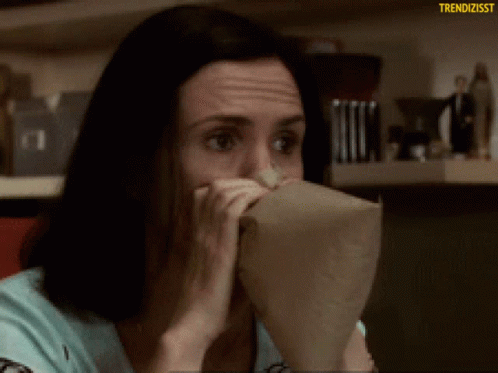 Breathing On Paper Bag Hyperventilating GIF