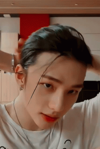 Rapper Hyunjin Tying Up Hair GIF