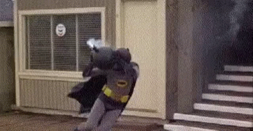 Batman Holding A Bomb GIF