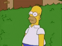I'm Out Homer Hiding The Grass GIF