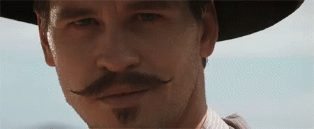 I'm Your Huckleberry Val Kilmer Wink GIF