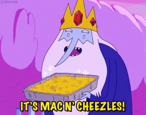 Ice King From Adventure Time Is Holding A Tray Of Mac N Cheezles GIF