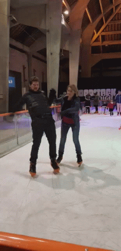 Couple Chaotic Ice Skating GIF