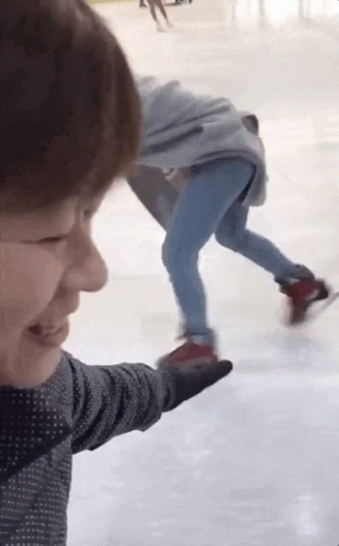 Woman Falling On Ice Skating GIF