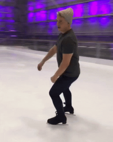 Guy Showing Skills In Ice Skating GIF