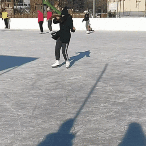 Girl Falling While Ice Skating GIF