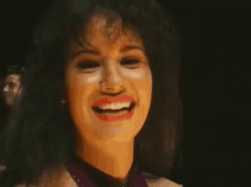 Iconic Selena Quintanilla Waving Hi GIF