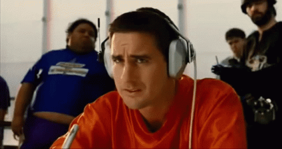 Idiocracy Luke Wilson Wearing Headset While Seating GIF