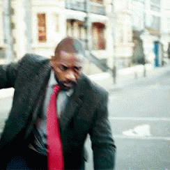 Idris Elba Snicking Around GIF