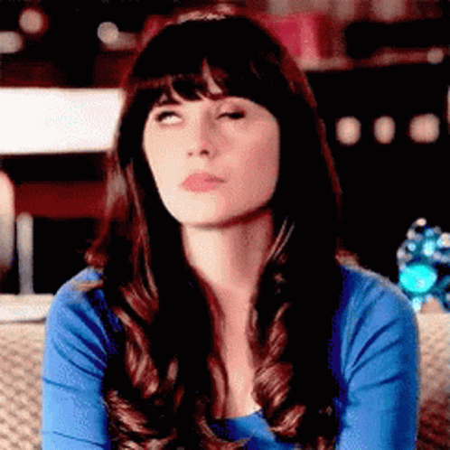 Ignore Zooey Deschanel Eye Roll GIF