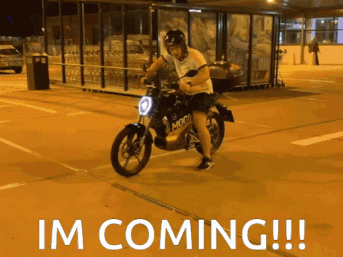 Im Coming Riding Motorcycle GIF
