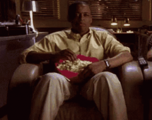 Im Sat Eating Popcorn GIF