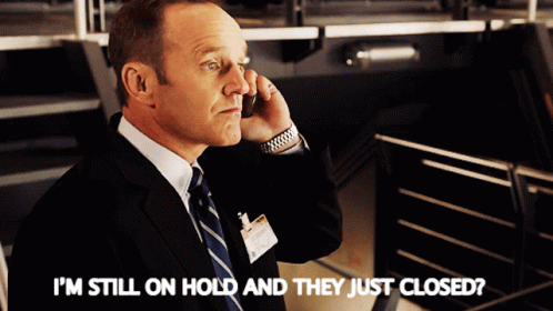 Im Still On Hold Clark Gregg Waiting GIF