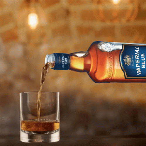 Imperial Blue Seagram Whisky Poured Into Glass
