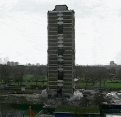 Implosion Of Building Like Jenga Game GIF