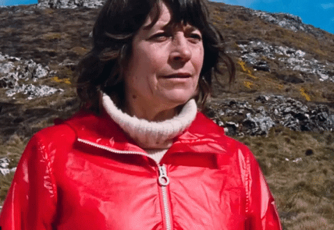 Inca Lady Reluctant Hand Wave GIF