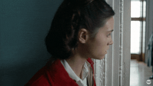 India Eisley Peeking From The Wall GIF