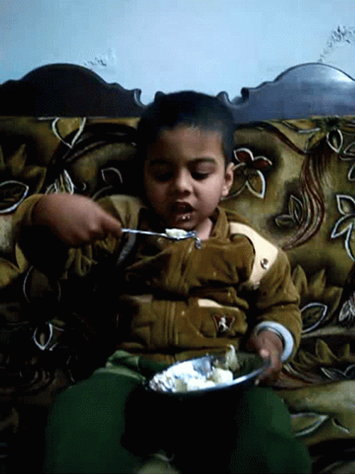 Indian Kid Eating Cake GIF