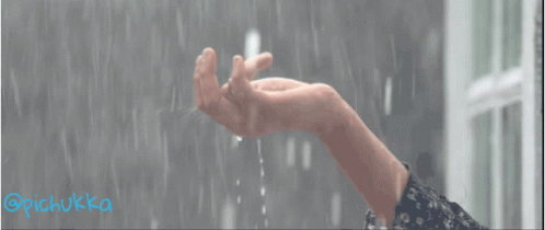 Indian Lady Catching Monsoon Rain GIF