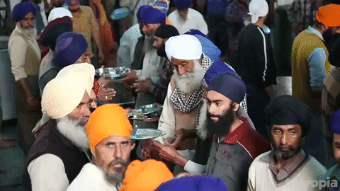 Indian Men Workers Passing Food GIF