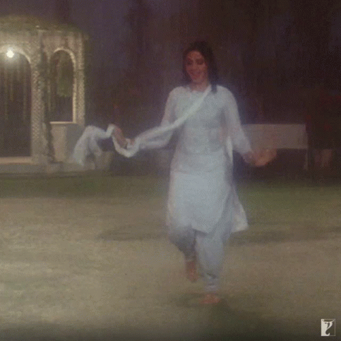 Indian Woman Silly Dance Moves In Monsoon Rain GIF
