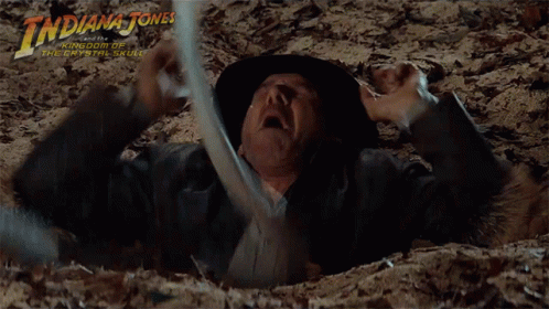 Indiana Jones Sinking On Quicksand Scene GIF