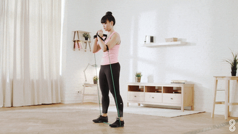 Indoor Woman Band Squats GIF