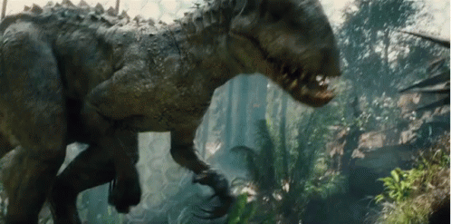 Indoraptor Fighting With Young Dinosaur GIF