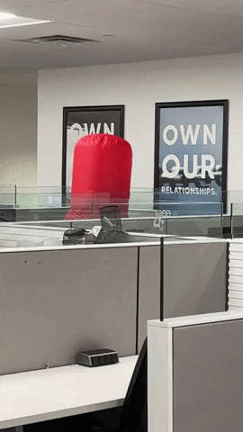 Inflatable Tube Man Invading Office GIF