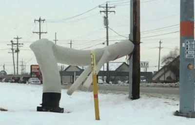 Inflatable Tube Man Twerking In Snow GIF