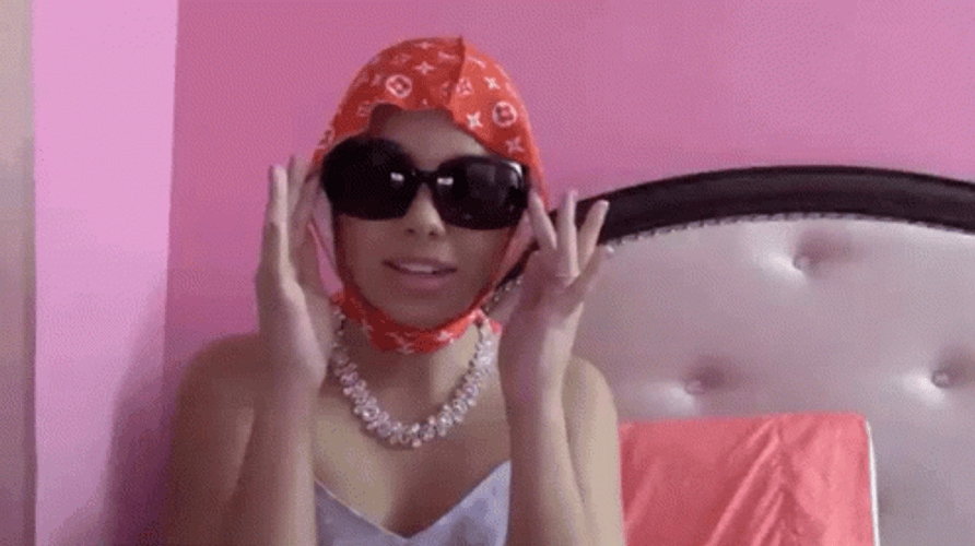 Influencer Showing Her Glasses  GIF