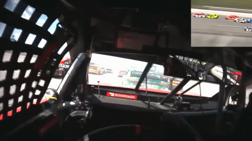 Inside Race Car With TRP on Dashboard