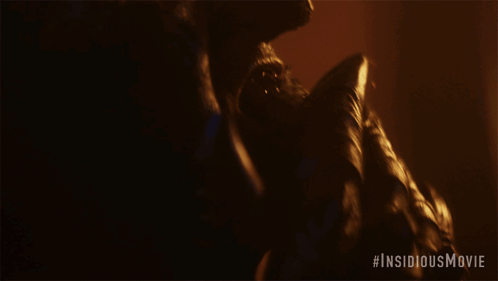 Insidious Person Holding Sword GIF