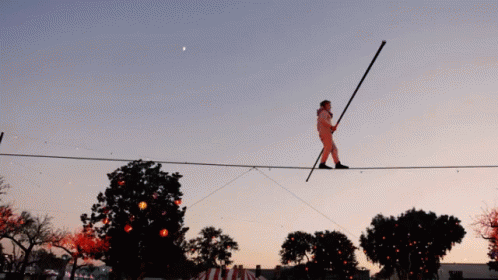 Intense Circus Wire Crossing Stunt GIF