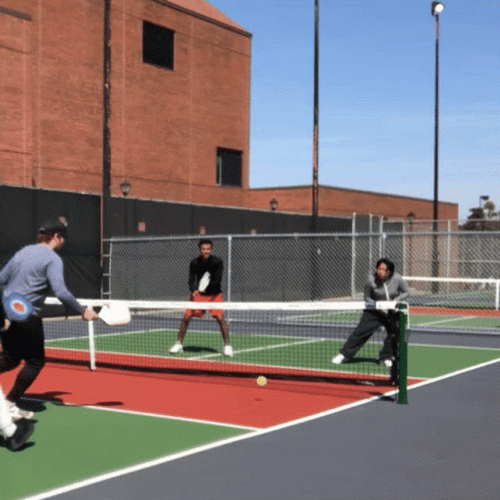 Intense Pickleball Match Return Shot GIF