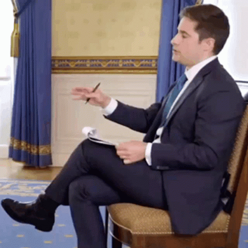 Interview Jonathan Swan Discussing GIF